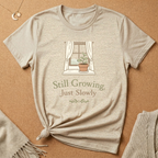 Still Growing, Just Slowly windowsill with plant Tee