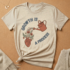 Growth Is a Process with heart and watering can Tee